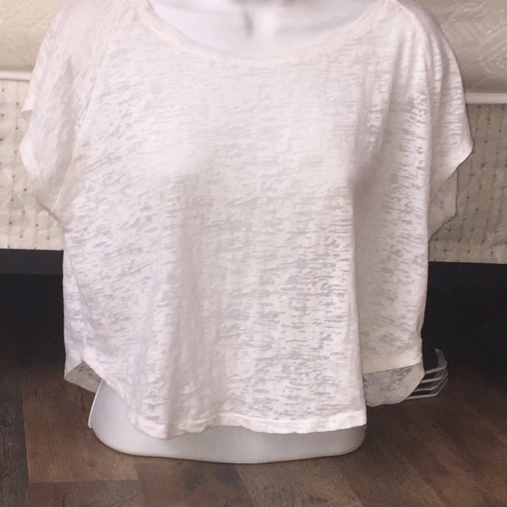 A white marbled crop top; size small